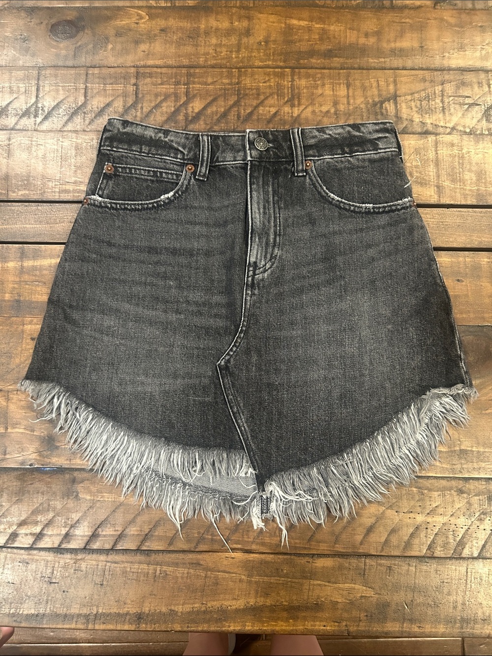 NWOT We The Free Distressed Denim Skirt in Washed Black w. Raw Fringe Hem
